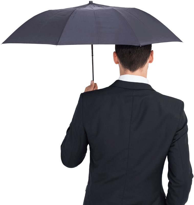 Man in suit holding umbrella