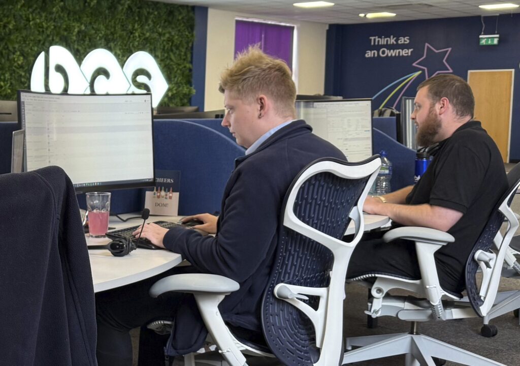 Two IT Support engineers in Kent working on resolving an IT issue for a Kent business.